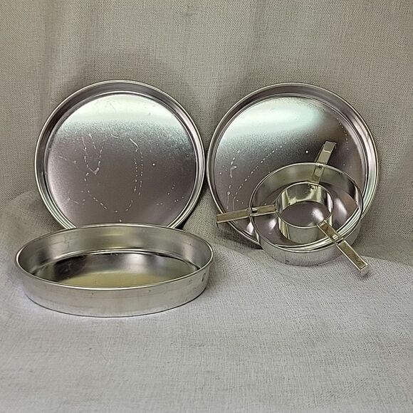 NIB NORPRO Checkerboard Round Cake Pan 4 piece Set W Recipes & Instructions - Picture 3 of 5